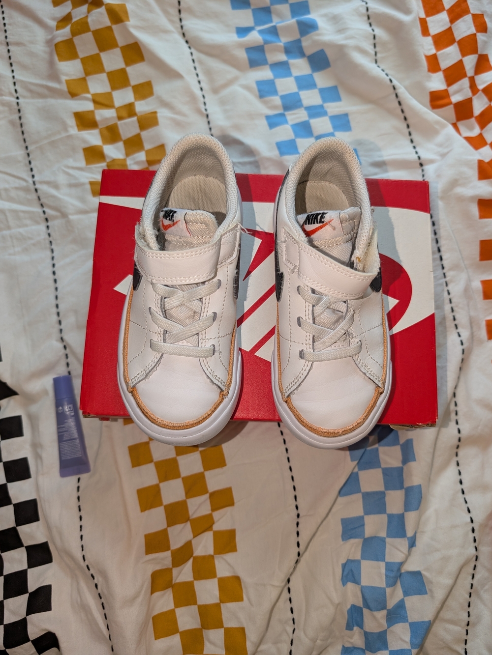Nike Kids White Sneaker with Black Swoosh and Orange Trim - Picture 2 of 6